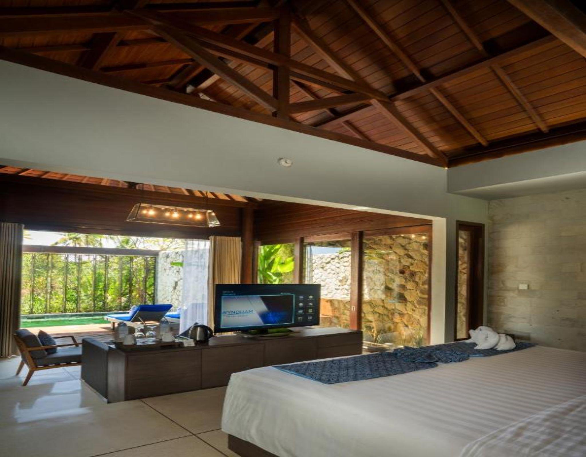 Wyndham Tamansari Jivva Resort Bali Siyut Eksteriør billede A bedroom at the resort